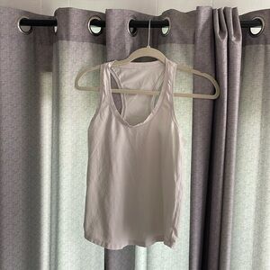 Women’s size 8 bone color Lululemon racer back tank top